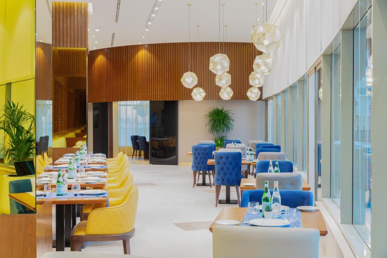 Hotel Barcelo Al Jaddaf, Dubaj Zewnętrze zdjęcie Interior of the restaurant